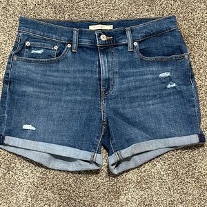 Levi’s mid-rise distressed jean shorts, size 31